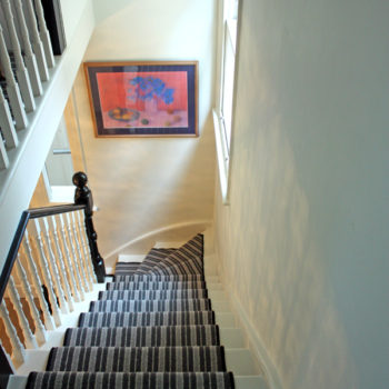 Stripe stair runner carpet to emphasis new staircase