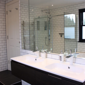 His & Hers Sinks in refurbished bathroom by DNA Architects